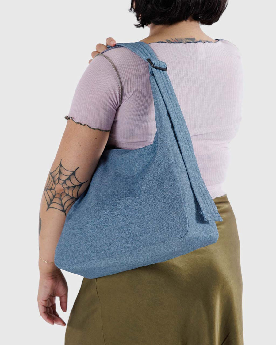 model carrying digital denim nylon shoulder bag