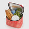 red and white gingham puffy lunch bag with food inside