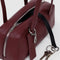 black key leash on medium mahogany recycled dome bowler bag with silver charm clasp