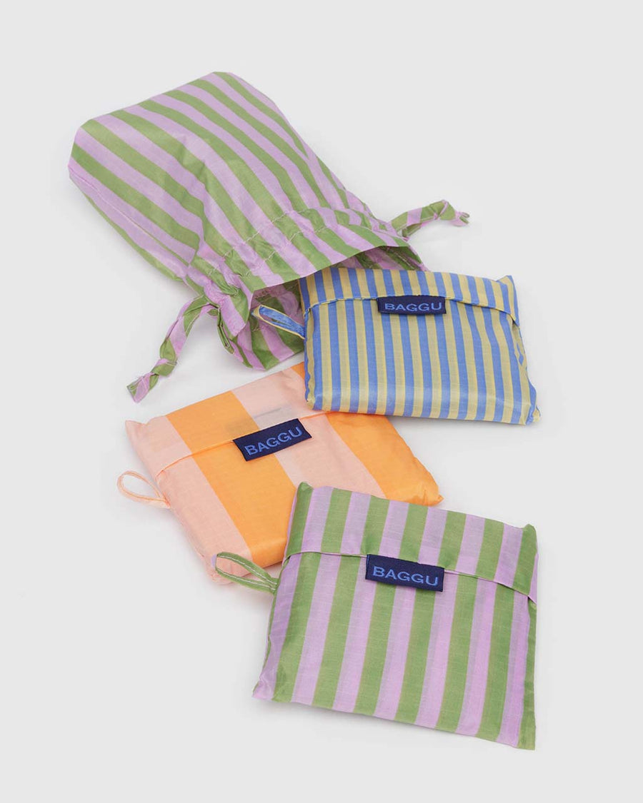 packaged set of three striped standard baggus: tangerine wide stripe, thin blue stripe and avocado candy stripe