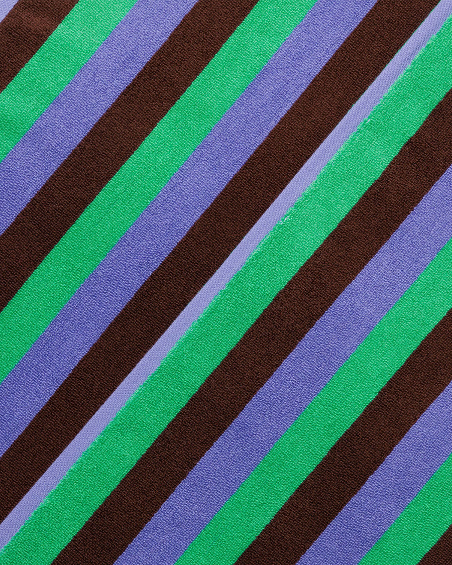 up close of green, blue, and brown striped towel