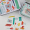 tin with sticker flakes with stationary theme