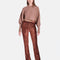 model wearing brown crushed velvet flared pants