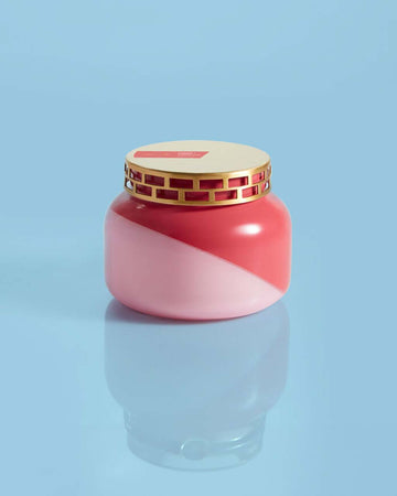 two tone: light pink and pink candle with a pineapple flower scent and gold lid