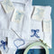 completed ribbon bow napkin embroidery set with embroidery ring, scissors, bow templates and dark blue embroidery tread