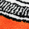 up close of orange prescription bottle throw rug