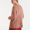back view of model wearing brown fuzzy textured oversized cardigan