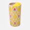yellow and white ceramic travel coffee tumbler with red floral print