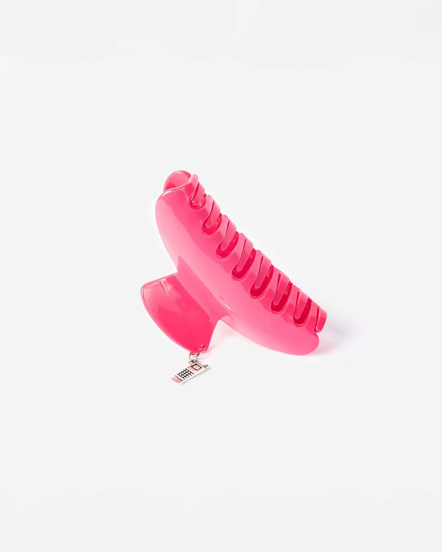 hot pink hair claw with small cellphone charm