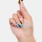 model holding multicolored reversible mini hair claw