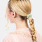 model wearing mint, black, and lavender mini silk scrunchies