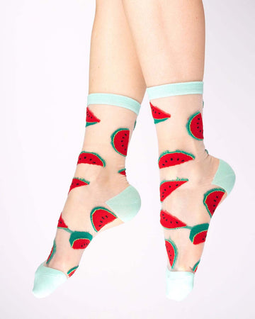 model wearing sheer socks with watermelon print and mint trim