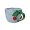 blue mug with scalloped top and 3D cherry design on the green handle