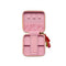 light pink interior of coral jewelry case with multicolor tassel and gold 'you're a gem, you know that?' across the front