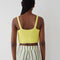 back view of model wearing yellow knit cropped tank