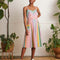 model wearing colorful vertical striped midi sundress with side patch pockets and colorful button front