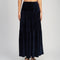 model wearing navy velour midi tiered skirt  and matching tank