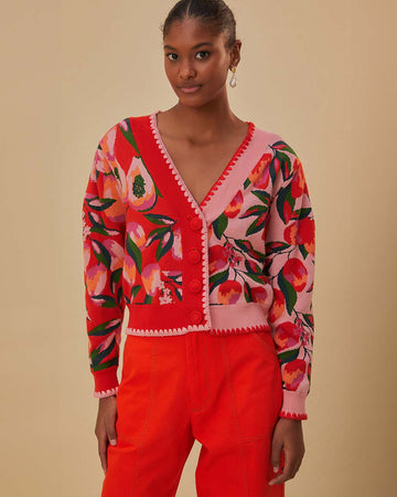 model wearing two tone cropped cardigan with red papaya and pink papaya