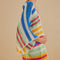 side view of model wearing colorful stripe crochet kimono
