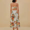 back view of model wearing white skirt with eyelet detail and colorful floral print