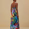 back view of model wearing blue abstract print maxi dress with corset bodice