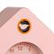 up close of light pink house shaped alarm clock with orange numbers and light pink cuckoo bird