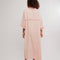 back view of model wearing pink long robe with bright pink trim