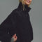 side view of model wearing black vegan suede relaxed fit jacket