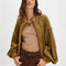 model wearing slouchy olive green textured open front cardigan