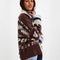 side view of brown and cream floral cardigan with cream trim