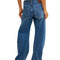 backview of model wearing low rise dark denim barrel jeans