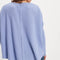 back view of model wearing periwinkle oversized thermal top