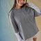 model wearing heather grey oversized tee