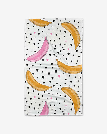 white tea towel with yellow and pink pop art banana print