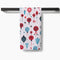 cream tea towel with colorful ornament and tree print on a towel rack