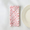 set of 6 white napkins with red holiday doodle print