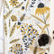 up close of white tea towel with goldenrod floral and bee print