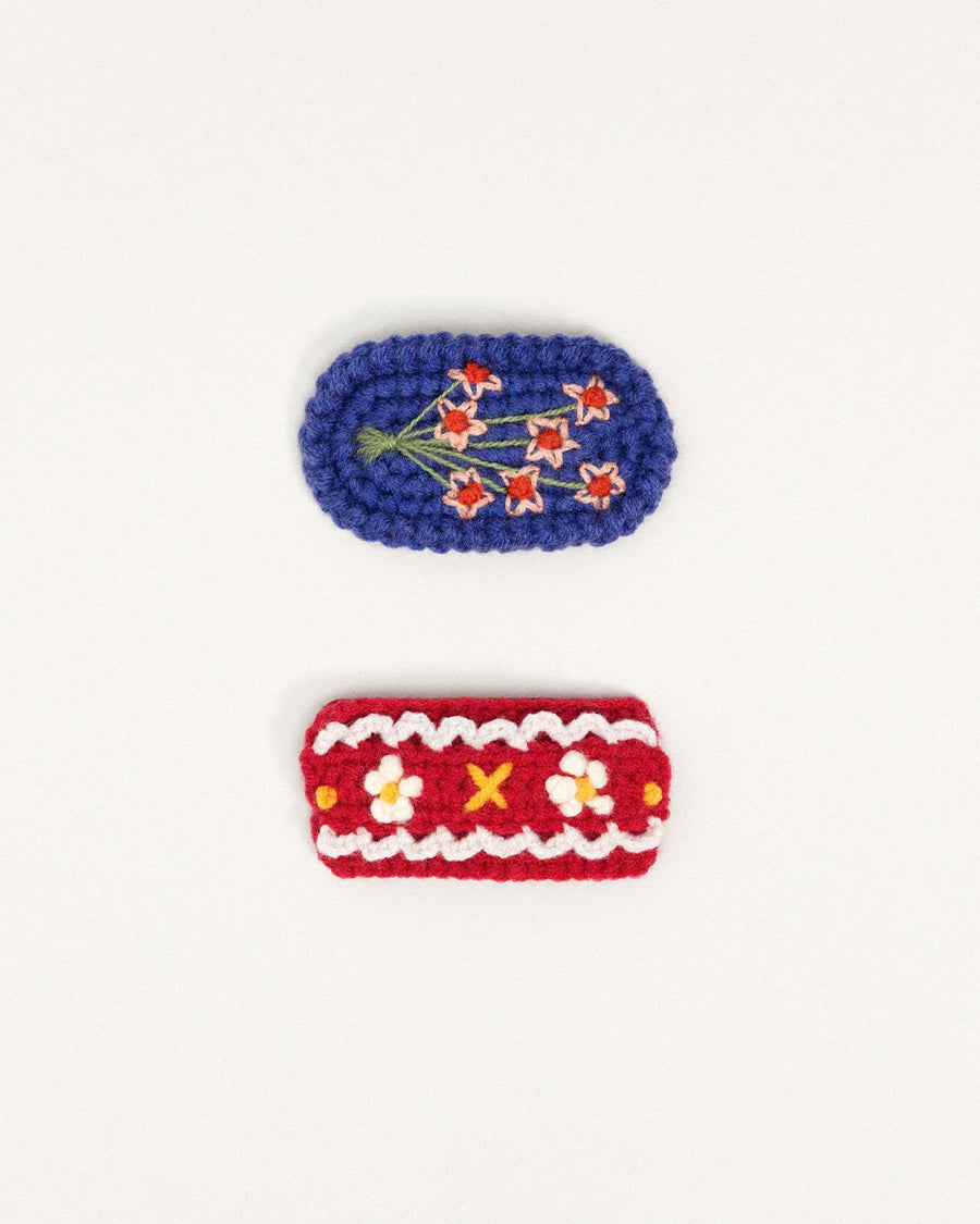 set of two crochet hair clips: blue floral and red floral