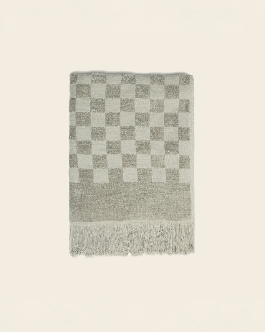 folded sage checkered bath towel