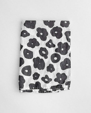 white tea towel with black floral print