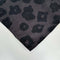 black napkin with with black abstract flower pattern