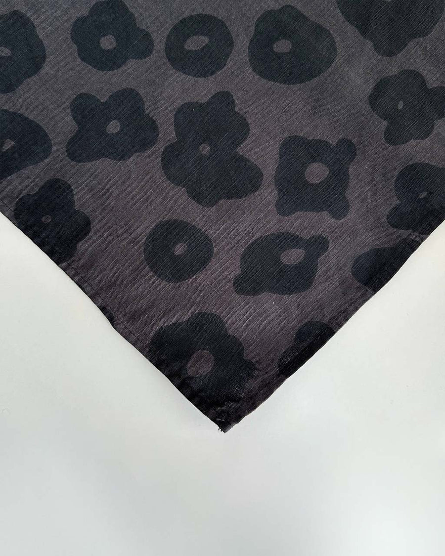 black napkin with with black abstract flower pattern