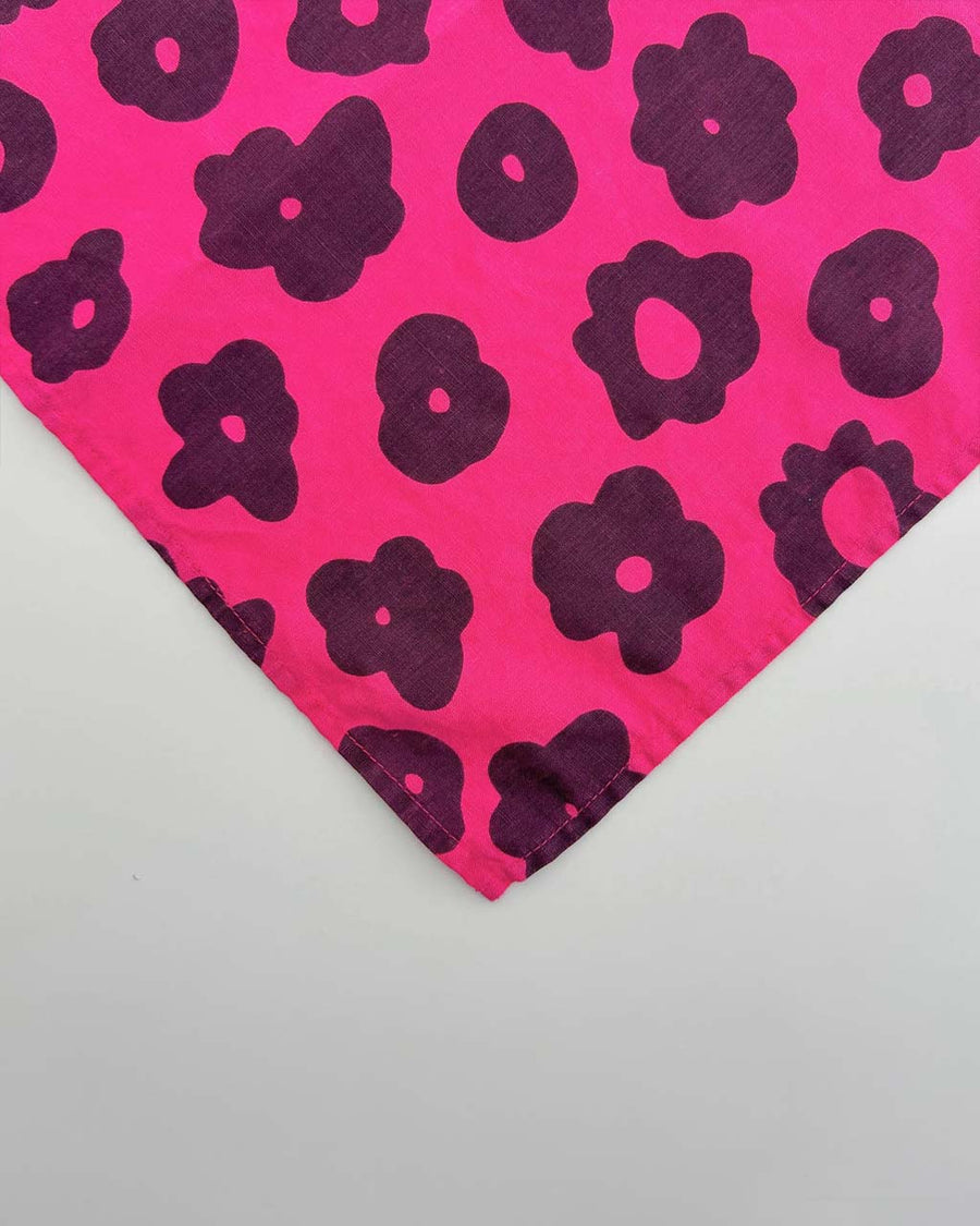 hot pink napkin with with black abstract flower pattern