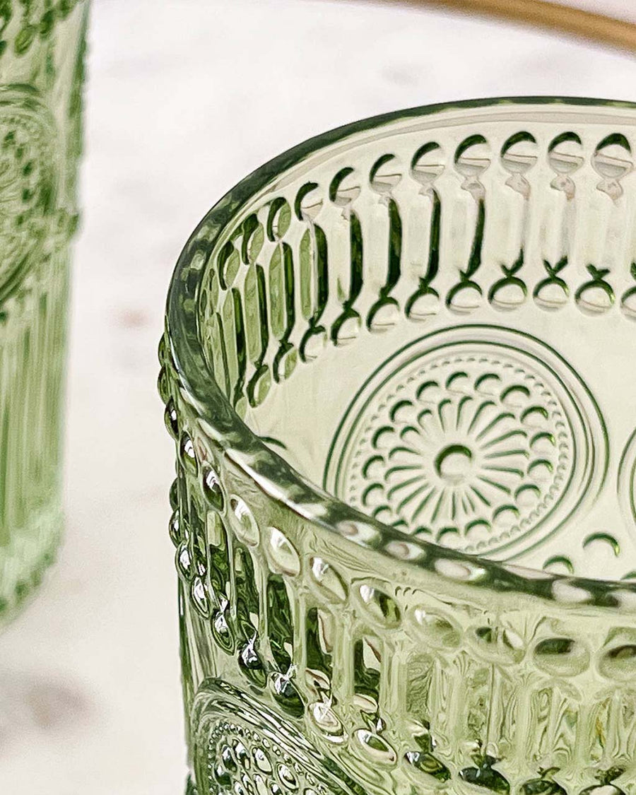 up close of green textured drinking glasses