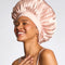 model wearing pink satin oversized satin bonnet