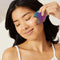 model using Iridescent stainless steel gua sha