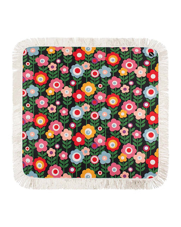 medium foldable picnic mat with colorful mod inspired floral print and white fringe
