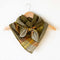 knotted retro inspired dark green, yellow, and orange plaid scarf