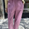 model wearing dusty lilac cotton relaxed pant