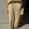 model wearing butter yellow balloon pants with matching top
